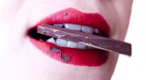 biting chocolate